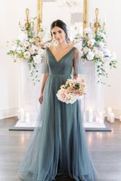 Stijlvolle lange blauwe bruidsmeisjesjurken met lint a-line tule v-neck formele feestjurk vloer lengte bruiloft gasten jurken voor vrouwen