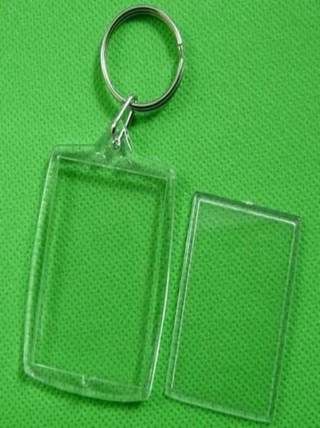 Clés en plastique en plastique en acrylique en acrylique Insérer un cadre de passeport PO Cadre de porte clés de porte clés de tête de porte