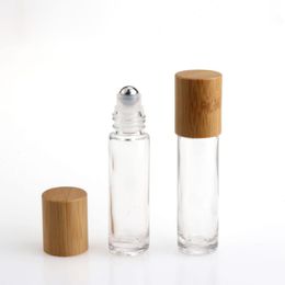 Duidelijke essentiële olierolflessen 10ml bamboooo deksels glazen rol op parfumflessen met SS-bal 750pcs lot