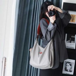 Opruiming Retail Groothandel 95% korting op de tas en Baobao Dumpling Handtas 2024 Nieuwe minimalistische postman Hobo Moeder Waterdicht Kind Nylon Schouder Messenger Bags 2E3G