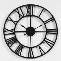 Horloges HOTSELLING FER MUTE CLORME, CLACE SIMPLE dans le salon, horloge en métal créative
