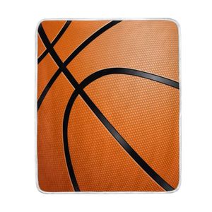 Gros plan sur une couverture de ballon de basket-ball doux et chaud confortable lit canapé léger polyester microfibre couverture jeter