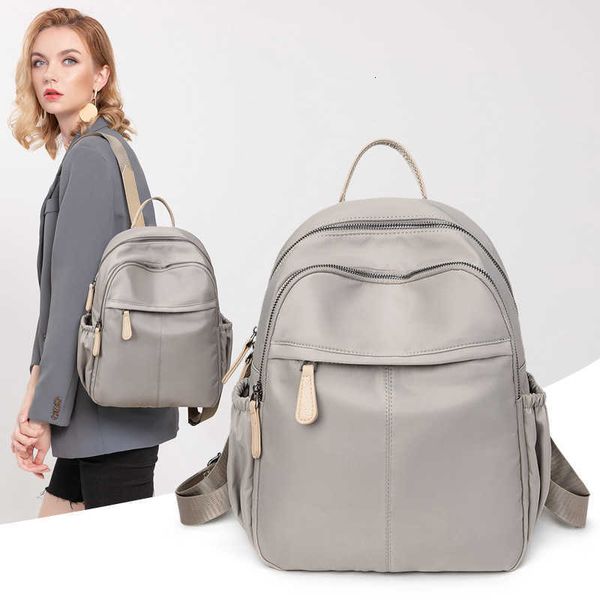 Tissu d'Oxford Sac à dos pour les femmes en Corée du Sud en Corée du Sud et à la mode Antiflants de grande capacité Sac Trendy 2024 Modèle