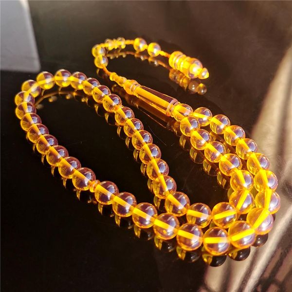 Vêtements Rosaire musulman Tournez violet dans le soleil 10 mm 33/45 Résine Amber Tasbih Sibha Tesbih Perles de prière Islamic Misbaha