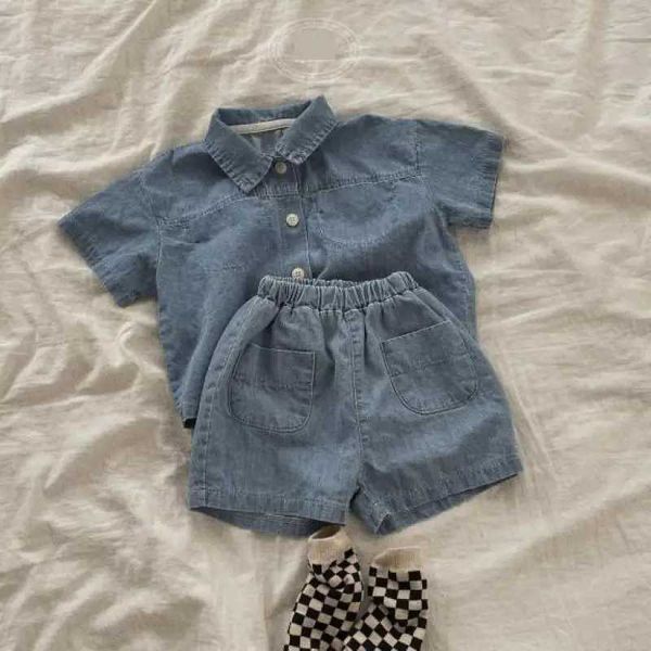 Ensembles de vêtements 2023 NOUVEAU Été Nouveau bébé à manches courtes en denim veste de jean ensemble de garçons solides filles shorts décontractés 2pcs costumes