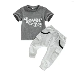 Ensembles de vêtements 2024 0-4Y Summer Baby Boy Letter Imprimé de manches courtes décontractées Tops de coton POCHETS POCHET