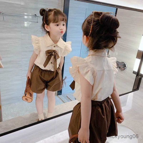 Ensembles de vêtements 2024 Kids Set Summer Small Flying Sleeve Shirt Pantal Bud Two-Piece Baby Girls Princess Sport Tracksuits pour enfants Vêtements