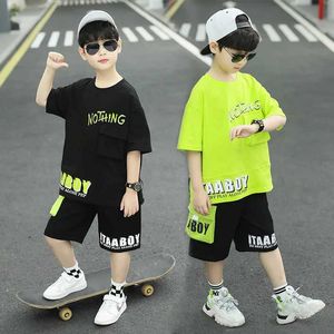 Kledingsets 2024 Nieuwe mode Summer Jeugdjongeren Kleding 3-12 Koreaanse vrije tijd T-shirt Shorts 2pcs Set Fun Cartoon Sportswear D240514