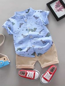 Ensembles de vêtements bébé et enfant en bas âge à imprimé complet mini motif de dinosaure court shorts à manches courtes définies en plein air