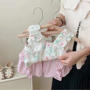 Ensembles de vêtements pour bébé fille d'été de la mode coréenne pour enfants à imprimé floral à imprimé mignon short en deux pièces 2024