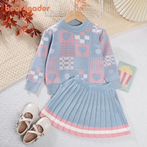 Conjuntos de ropa Bear Leader Conjuntos de suéter para niñas Conjunto de punto de otoño / invierno Top de punto con estampado geométrico para niñas Falda plisada a rayas Conjunto de dos piezas 231202