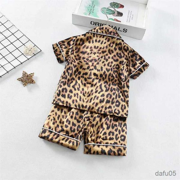 Conjuntos de ropa para niños Niños para niños Pajama Sets Cartoon Leopard estampado Camiseta de manga corta Tops pantalones niños pequeños para niños para dormir