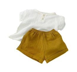 Vêtements Ensembles garçons costumes vêtements bébé mousseline de coton tenues de tshirt short décontracté enfants 39s à manches courtes tops pantalon 2p7065543