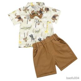 Completi di abbigliamento Abbigliamento estivo per ragazzi Toddler Neonati Cartoon Animal Print Camicia a maniche corte con papillon Short Holiday Beach Clothes R230518