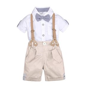 Conjuntos de ropa Traje de boda para niños Caballero pequeño Blusa blanca Pantalones cortos de color caqui Tirantes Pajarita a rayas Ropa
