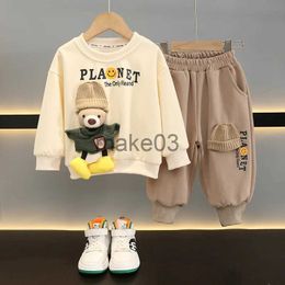 Kledingsets Kinderherfsttruiset 2023 Jongens en meisjes Baby Cartoon Lachend Mode Top + Joggingbroek Kinderen Tweedelig pak 2 4 6 8 10Y J231020