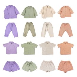 Kledingsets Kinderhemd 23 Zomerjongens en meisjes Solid Color Rapel Candy LongSleeveved broek Shortsleeveved shorts Pak 230818