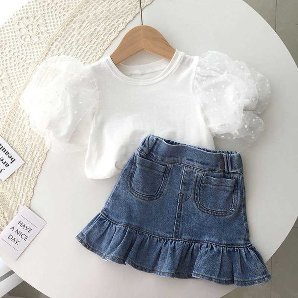 Ensembles de vêtements Costume pour enfants Summer Girls T-shirt blanc à manches courtes avec manches bouffantes Jupe en jean Ensemble deux pièces Vêtements pour enfants Filles