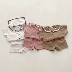 Ensembles de vêtements pour enfants ensemble de mode d'été mignon bébé fille col marin solide haut à manches courtes et short en coton lâche pour garçon 230410