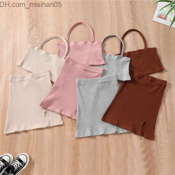 Conjuntos de ropa Conjuntos de ropa Moda 2 piezas Traje de verano para niños Color sólido Acanalado Cuello halter Sin mangas Crop Tops Falda corta con abertura para niñas 2 7 años Z230703