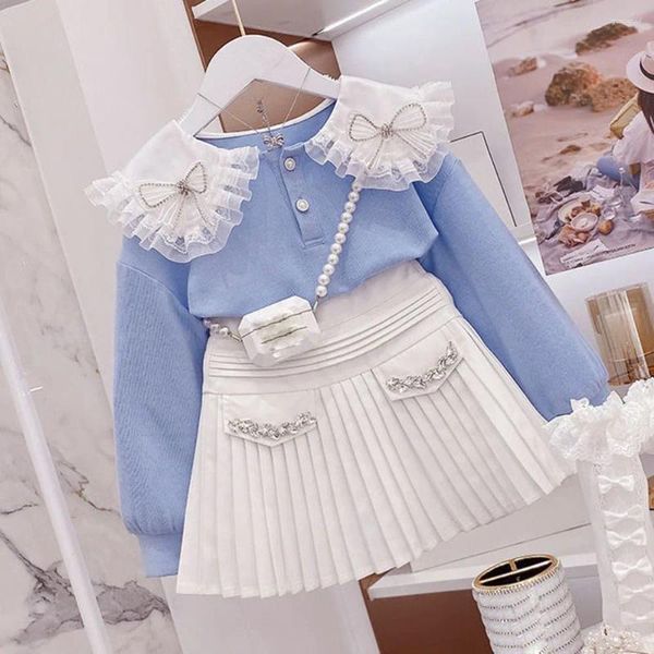 Conjuntos de ropa Conjunto de moda de primavera dulce para niña 2024 Sky Blue Bow Doll Collar Hilo Puños Top Falda plisada blanca Dos piezas