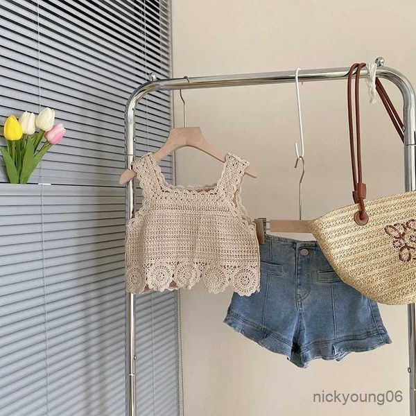 Vêtements Ensembles filles coréen Hollow Crochet Knitting Shirt Top Summer Sweet Holiday Style Vest Jeans Kids Vêtements Toddler Tshirt Denim Shorts