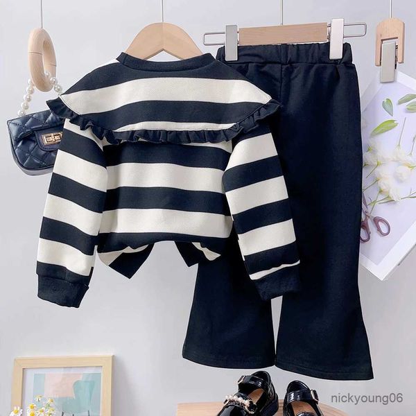 Conjuntos de ropa Girls Juego de manga larga Otoño e invierno nuevas chicas de solapa grande Top de rayas plisadas+Bell-Bottoms Two Piece Girls Set