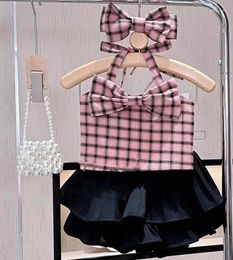 Kledingsets Girls Lovely Sweet Children Plaid Bow Mouwess Suspender Top Black Cake Skirts Tweedelige set 2024 Zomer