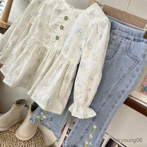 Kledingsets Girls Spring Suit 2023 Nieuwe Koreaanse baby bloemblouse shirt denim broek 2-delige kinderen casual kleding set