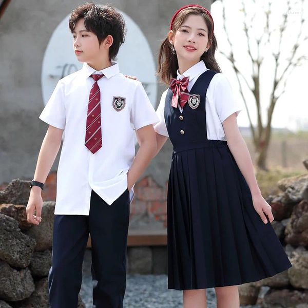 Conjuntos de ropa Niño Uniforme escolar japonés Camisa blanca Azul marino Plisado Pinafore Vestido Pantalones Pantalones cortos Pajarita para niña Ropa de niño Conjunto Estudiante