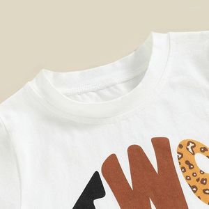 Ensemble de vêtements pour enfants T-shirt à manches courtes à manches courtes et aux pantalons floraux à fusée florale décontractée.