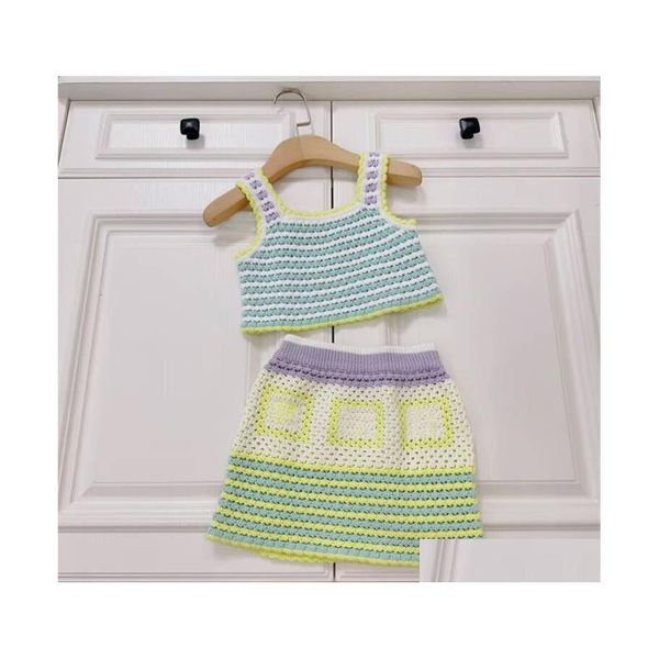 Conjuntos de ropa Niños Niñas Crochet Hallow Out Diseñador de moda Tops sin mangas de punto Línea Adda Faldas Trajes Ropa de bebé de verano Drop Otnbl