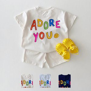 Kleding Sets Korea Baby Meisje Kleding Set Dubbelzijdig Afdrukken Lachend Gezicht Brief T-shirt Tees Losse Katoenen Shorts 2 Pc jongen 230601