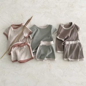 Ensembles de vêtements Vêtements pour enfants coréens pour bébés font de vieilles couleurs Sports de loisirs Costume à manches courtes Ensemble de deux pièces en coton pour hommes et femmes