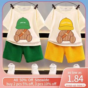 Kledingsets Koreaanse kinderen Summer Suit Girl en Boy Short Sheeved Suit Childrens Clothing Fashion T-Shirt Country Colored Pants Set Childrens Clothing Y240515