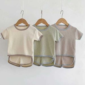 Kledingsets Koreaanse stijl Pasgeboren jongens en meisjes kledingset korte mouwen vaste katoenen t-shirt+korte mouwen kinderkleding set J240518