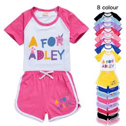 Ensemble de vêtements Nouveaux filles et garçons de vêtements d'été Adley Childrens Sports T-shirt + pantalon 2 pièces Baby Clothing confortable Set Pyjamas D240514