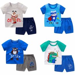 Ensembles de vêtements Nouveaux costumes à manches en coton pur Tshirtshorts pcs Oneck Loose Fashion Cartoon Animals Pantalons Tailles régulières Vêtements pour enfants