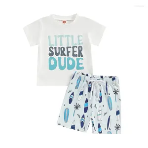 Kledingsets Pudcoco Toddler Baby Boy Summer Outfit Letter Afdrukken Korte mouw T-shirt met cartoon surfboard shorts 2 stks set 0-3t