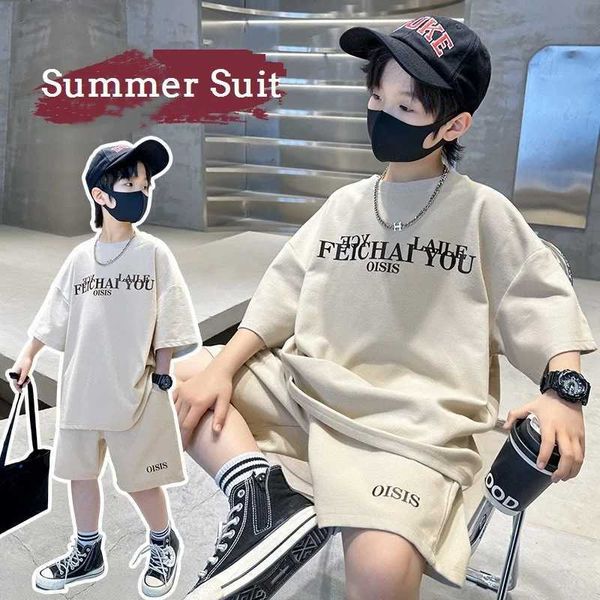 Ensembles de vêtements Summer Casual Boy Cotton Lettre T-shirt Top + Shorts à cordon Set École Childrens Suit et champ Childrens 2pcs Jogging Set 5-16 ans D240514