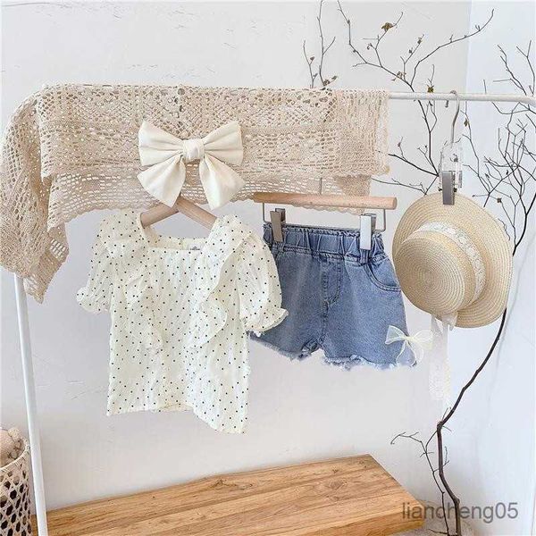 Conjuntos de ropa Verano Nuevo Conjuntos de ropa para niñas Puntos lindos Ruffle Top + Lazo de encaje Pantalones cortos de mezclilla Ropa de bebé para niños pequeños Traje Moda para niñas Traje para niños R230805