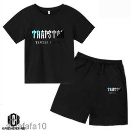 Ensembles de vêtements Été Trapstar Tshirt Enfants Garçons Shorts de plage Streetwear Survêtement Hommes Femmes Vêtements Vêtements de sport pour filles 230630 RDHN