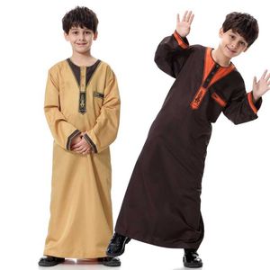 Kleding sets jeugd thobe kinderen Arabische volkskleding kinderen 5-12 jaar oude solide kleur kleding jongens lange mouwen ramadan thawb zomer moslimgewaad Q240517