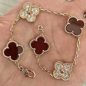 Trèfles Bracelet De Luxe Trèfle Designer Perle 4 Feuilles Or 18 Carats Laser Marque Bracelet Charme Bracelets Collier Boucles D'oreilles De Mariage 17vy8tkr9