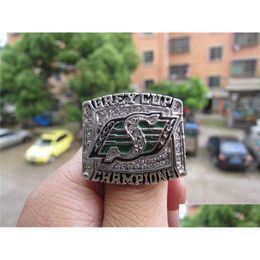 Clusterringen 2007 Saskatchewan Roughriders The Grey Cup Championship Ring met houten kist Mannen Fan Souvenir Cadeau Groothandel Drop Drop D Dhxgs