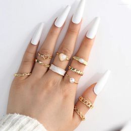 Cluster anneaux 2024 Bohemian Style White Edge Dropped Huile Pearl Love Ring 10 PCS / Set Cross Brorder ajusté pour femmes bijoux Girls