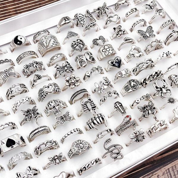 Bagues de cluster 50 / 100pcs / lot hip hop vintage pour femmes en gros punk coeur fleur crâne papillon Tai Chi bague bijoux fête