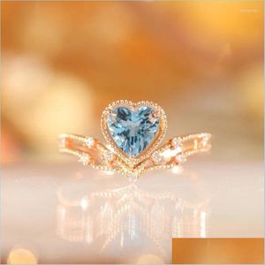 Bagues de cluster Bagues de cluster Sterling Sier Mode Tempérament Réglable Topaz Bleu Amour Coeur Bague Femmes Exquis Bijoux Accesseur Dhtlw