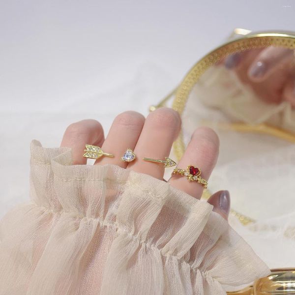Bagues en grappe Design Cuivre exquis incrusté de Zircon Cupidon's Arrow Ring 14K plaqué or véritable en forme de coeur Bijoux coréens ouverts pour femmes