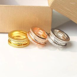 Anillos de racimo Anillo de acero de titanio de alta calidad Engranaje Zirconl Versión estrecha Joyería de moda para mujeres Hombres Cumpleaños Regalos de Navidad